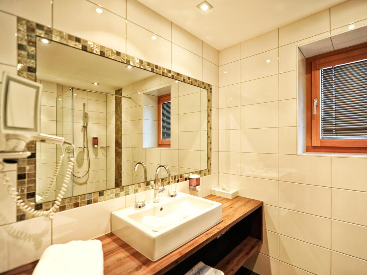 Hotel Garni Alpenland อิสชเกิล ภายนอก รูปภาพ